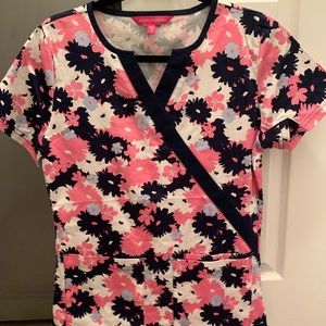 Brand new scrub top. Never worn